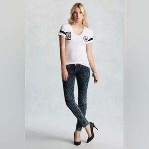 True Religion -- denim acid wash low-rise skinny jeans